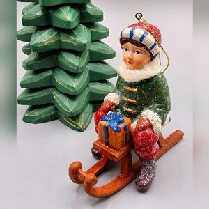 Vintage Christmas Ornament Girl On A Sled